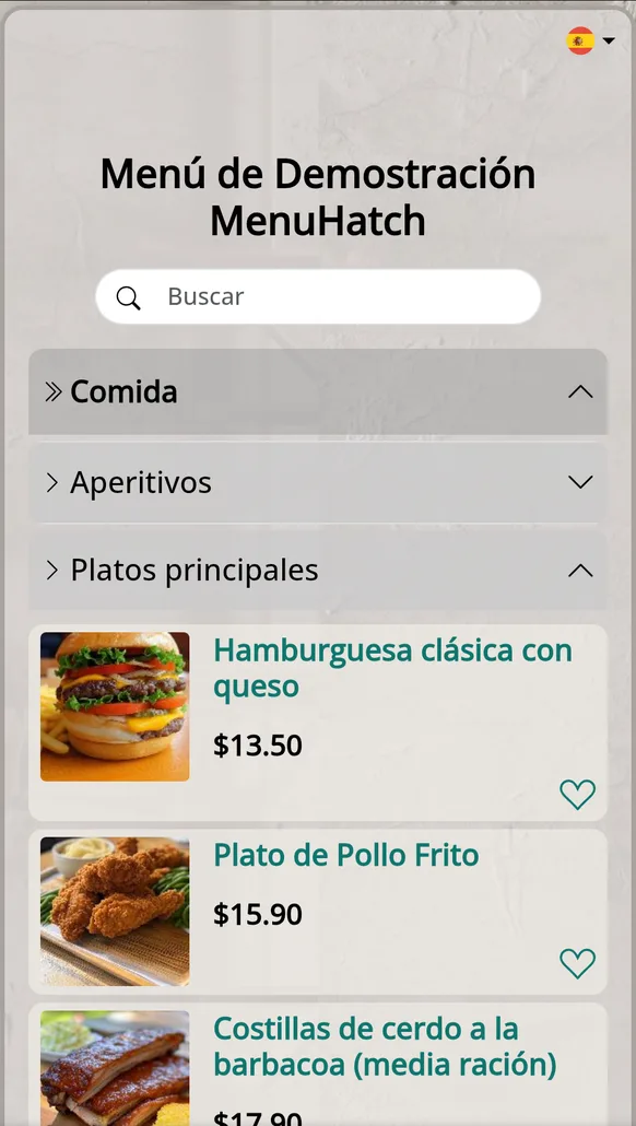 The same menu in Spanish: Comida, Aperitivos, Platos principales and translated dish names